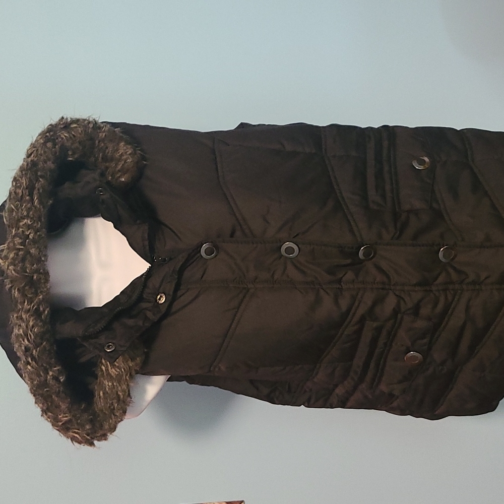 Ladies Vest With Detachable Hood.